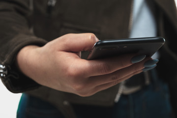 young woman holding a mobile phone
