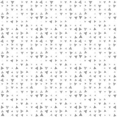 Abstract seamless pattern background with multi-colored varied triangles.