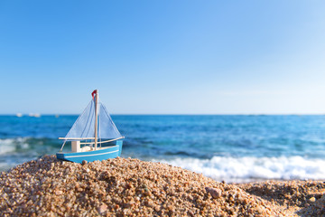 Fototapeta na wymiar Wooden sail boat at the beach