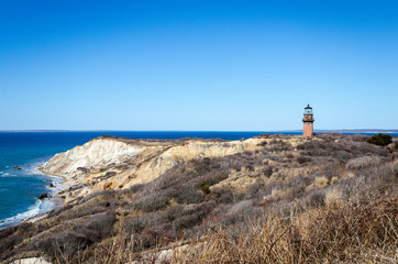 Fototapeta na wymiar Aquinnah Head view with Gay Head Lighthouse on Cape Cod on a sunny day