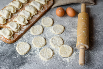 Preparation dough and production of circles from dough for preparation of dumplings with a stuffing. It can be used as a background