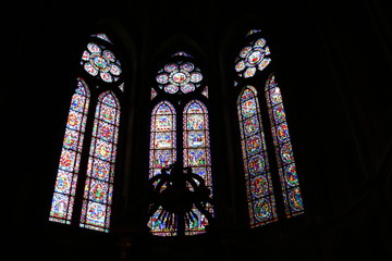 Colorful stained-glass window. Beautiful, gothic, historic Cathedral of Our Lady of Reims. Notre-Dame de Reims. Marne, Champagne-Ardenne, France