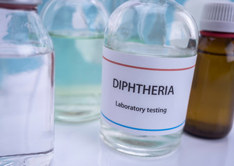 Test diphtheria in laboratory, conceptual image, composition horizontal