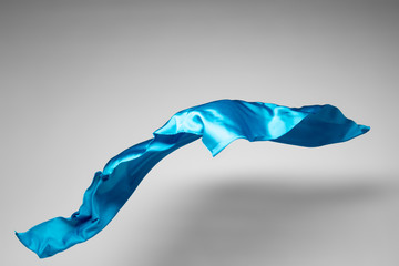 abstract teal fabric in motion