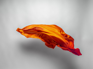 abstract orange fabric in motion