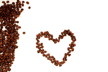 heart of coffee beans close-up view from