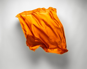 abstract orange fabric in motion