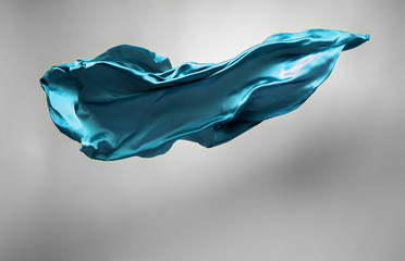 abstract teal fabric in motion