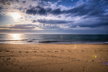 Fototapeta na wymiar Sunset on Race Point Beach of Provincetown Cape Cod, along the National Seashore beach