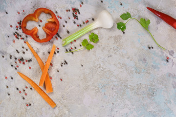 Organic garden vegetables ingredients around round cutting board , top view, copy space. Healthy food and diet nutrition concept.