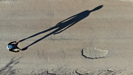 A shadow on the road.