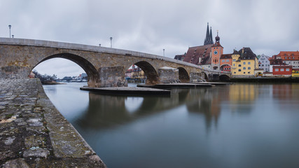 Panorama view from Danube on Regensburg Cathedral and Stone Bridge in Regensburg