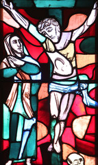 Mary under the Cross, stained glass window in Basilica of St. Vitus in Ellwangen, Germany 