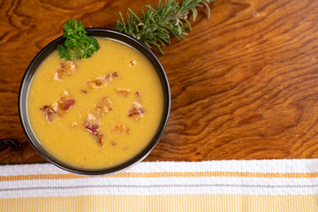 Delicious butternut squash soup with bacon bits