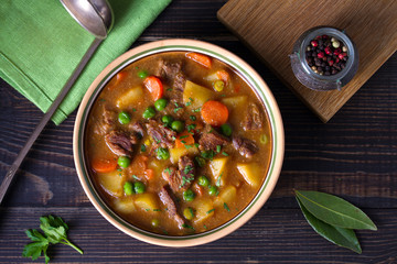 Traditional Irish lamb stew with vegetables. View from above, top studio shot