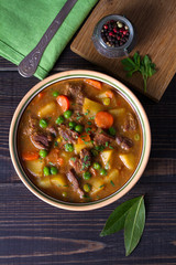 Traditional Irish lamb stew with vegetables. View from above, top studio shot