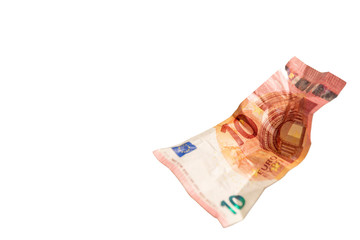 Crumpled euro note isolated on a white background, copy space