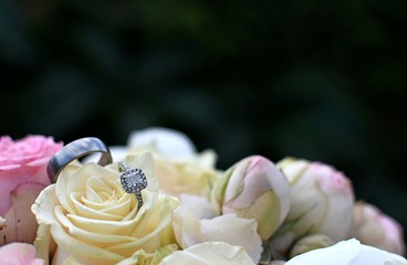 wedding rings on flowers