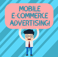 Word writing text Mobile E Commerce Advertising. Business concept for use of mobile devices in marketing brand Man Standing Holding Above his Head Blank Rectangular Colored Board