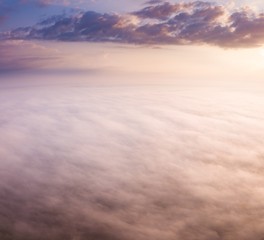 Fototapeta na wymiar Beautiful foggy sunrise landscape from drone.