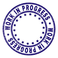 WORK IN PROGRESS stamp seal watermark with distress texture. Designed with round shapes and stars. Blue vector rubber print of WORK IN PROGRESS text with scratched texture.