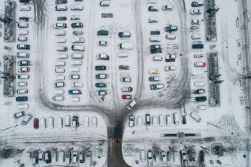 parked cars covered with snow