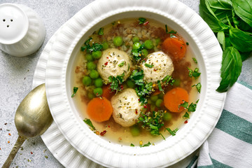 Buckwheat soup with vegetables and chicken meatballs.Top view with copy space.