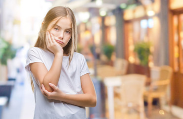 Young beautiful girl over isolated background thinking looking tired and bored with depression problems with crossed arms.