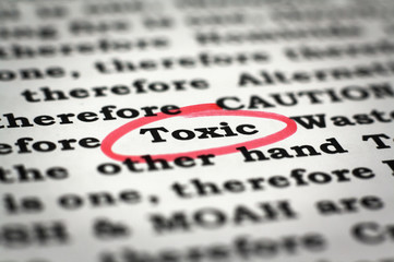 Newspaper with focus on the red marked word Toxic