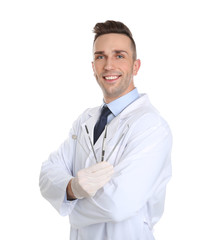 Male dentist holding professional tools on white background