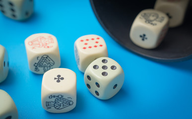 game dice close up on a blue background