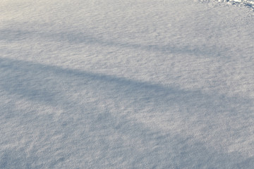 Photo of snow on a sunny day