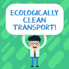 Handwriting text Ecologically Clean Transport. Concept meaning Green vehicle Environmentally friendly vehicle Man Standing Holding Above his Head Blank Rectangular Colored Board