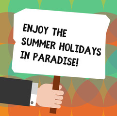 Conceptual hand writing showing Enjoy The Summer Holidays In Paradise. Business photo showcasing Go beautiful places in holiday season Hu analysis Holding Colored Placard with Stick Text Space