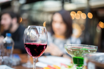 red wine on a young adult couple romantic table 