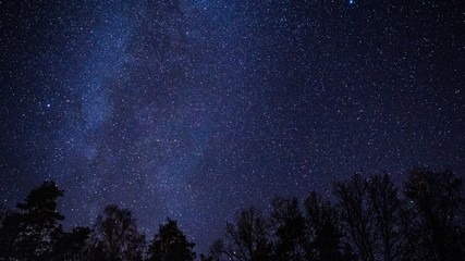 Fototapeta na wymiar Night sky over rural landscape.