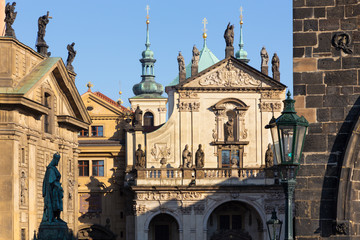 Praghe - The facade of St. Salvator church   and Křižovnické square from the Charles bridge.
