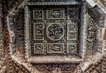 Halebidu, Karnataka, India - November 2, 2013: Hoysaleswara Temple of Shiva. Extensively decorated square mandala in octogenal mandala on ceiling in Mandapam.