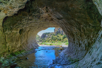 Naklejka na ściany i meble cavern in cave stream scenic reserve, new zealand 8