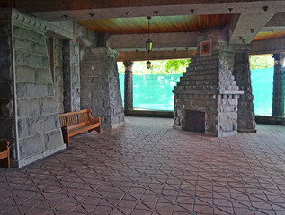 Stone fire place under porch