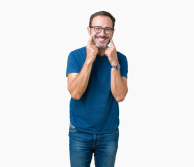 Handsome middle age hoary senior man wearin glasses over isolated background Smiling with open mouth, fingers pointing and forcing cheerful smile