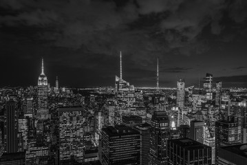 Fototapeta na wymiar The Empire State Building and Midtown Manhattan skyline at night, in New York City