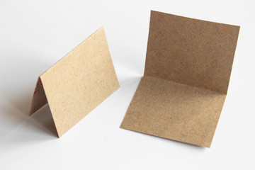 Brown blank portrait. brochure magazine isolated on gray, changeable background / brown paper...