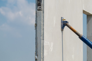 steel use for cling on the precast concrete wall, Installation of prefabricated house.