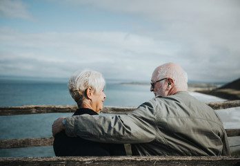 Senior couple enjoying the view of the ocean