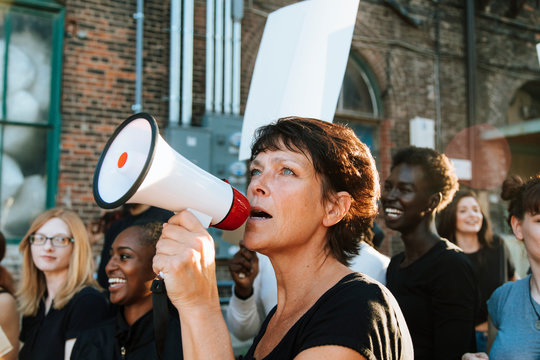 Feminist With A Megaphone At A Protest