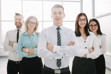 confident business team on the background of a bright office.