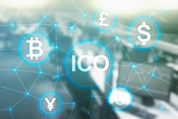 ICO - Initial coin offering, Blockchain and cryptocurrency concept on blurred business building...