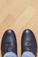 Elegant stylish leather brown shoes for men on board, place for text
