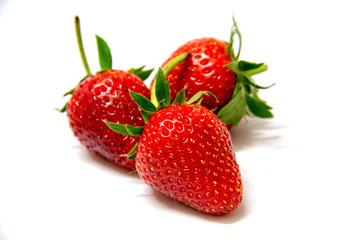 strawberries close up on white background